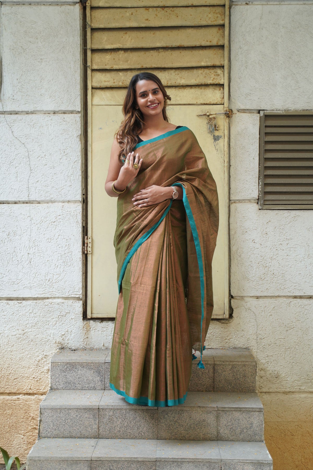 Metallic Copper Khadi Tissue with Dynasty Green Border Saree