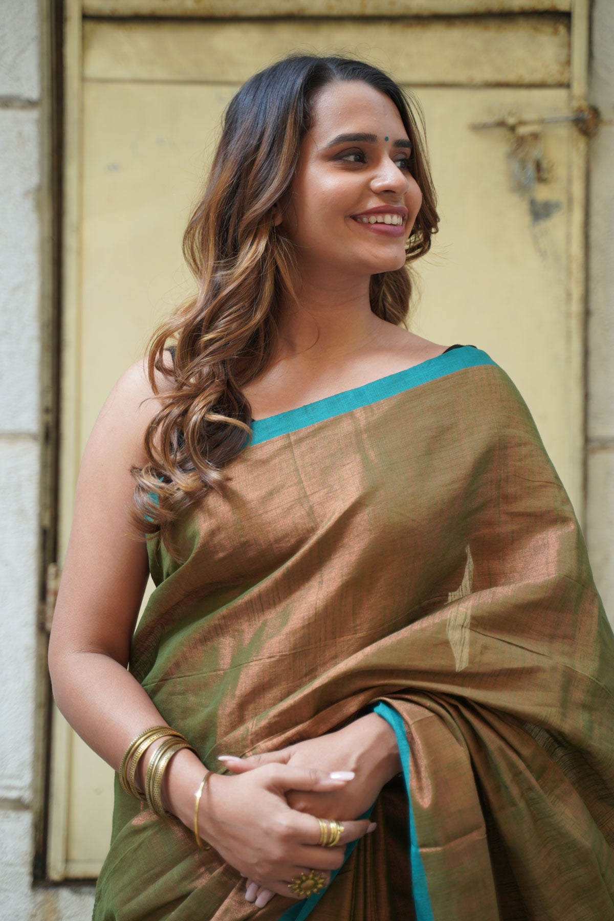 Metallic Copper Khadi Tissue with Dynasty Green Border Saree